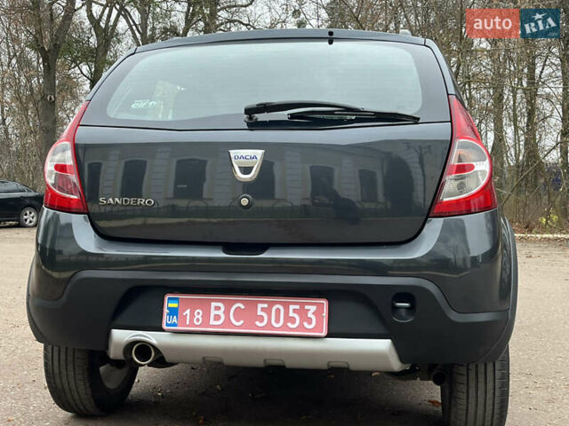 Серый Дачия Sandero StepWay, объемом двигателя 1.6 л и пробегом 60 тыс. км за 6999 $, фото 176 на Automoto.ua