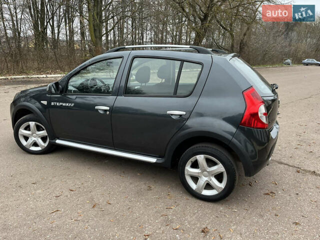 Серый Дачия Sandero StepWay, объемом двигателя 1.6 л и пробегом 60 тыс. км за 6999 $, фото 165 на Automoto.ua