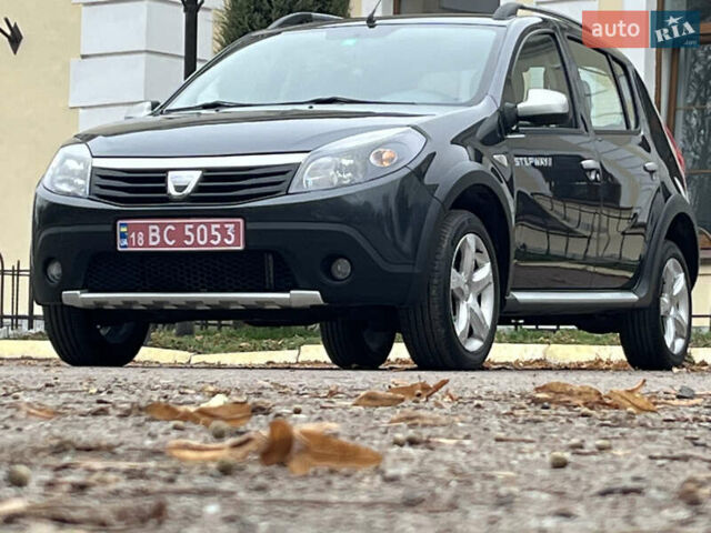 Серый Дачия Sandero StepWay, объемом двигателя 1.6 л и пробегом 60 тыс. км за 6999 $, фото 145 на Automoto.ua