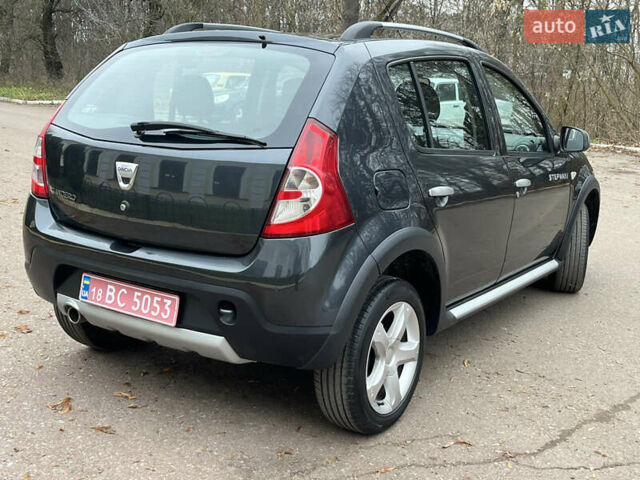 Серый Дачия Sandero StepWay, объемом двигателя 1.6 л и пробегом 60 тыс. км за 6999 $, фото 26 на Automoto.ua
