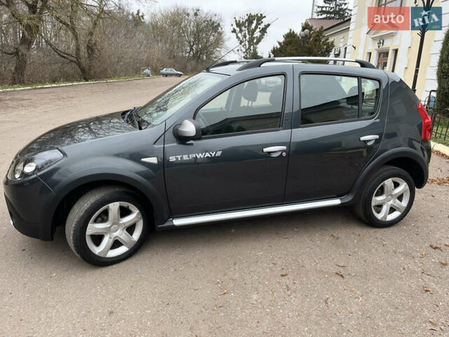 Серый Дачия Sandero StepWay, объемом двигателя 1.6 л и пробегом 60 тыс. км за 6999 $, фото 161 на Automoto.ua