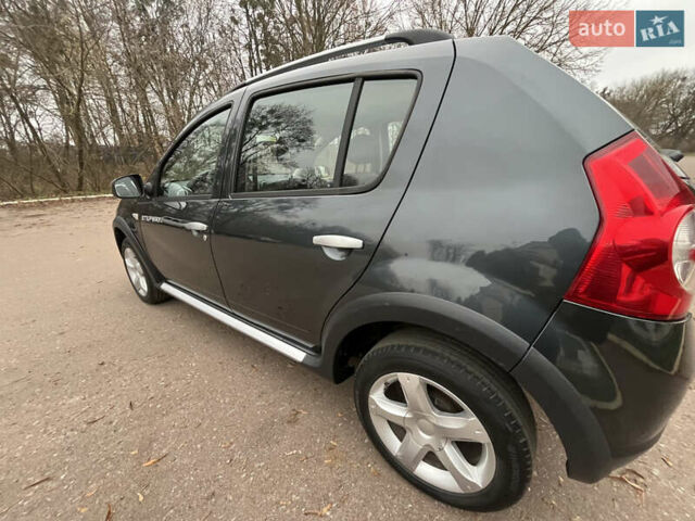 Серый Дачия Sandero StepWay, объемом двигателя 1.6 л и пробегом 60 тыс. км за 6999 $, фото 124 на Automoto.ua