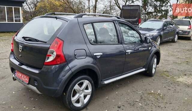 Серый Дачия Sandero StepWay, объемом двигателя 1.6 л и пробегом 128 тыс. км за 7300 $, фото 7 на Automoto.ua