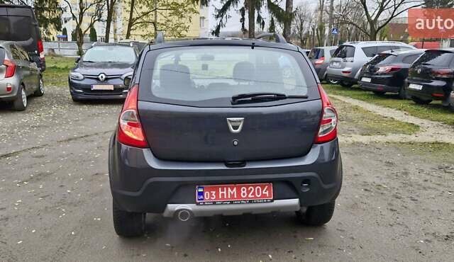 Серый Дачия Sandero StepWay, объемом двигателя 1.6 л и пробегом 128 тыс. км за 7300 $, фото 1 на Automoto.ua