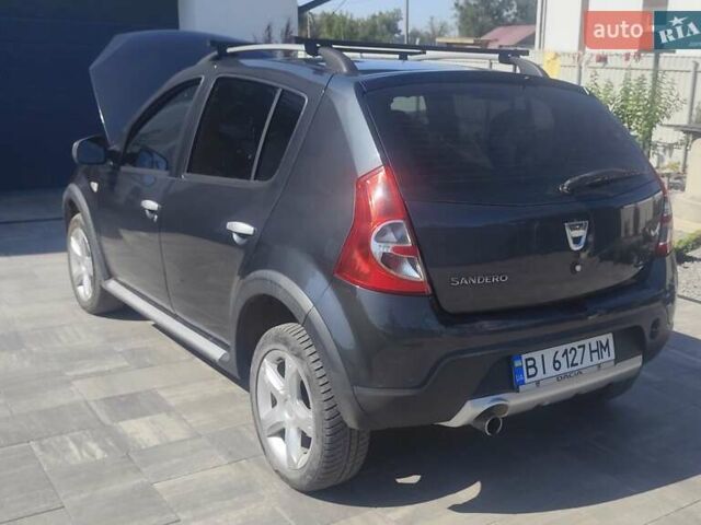 Серый Дачия Sandero StepWay, объемом двигателя 1.6 л и пробегом 129 тыс. км за 6900 $, фото 5 на Automoto.ua
