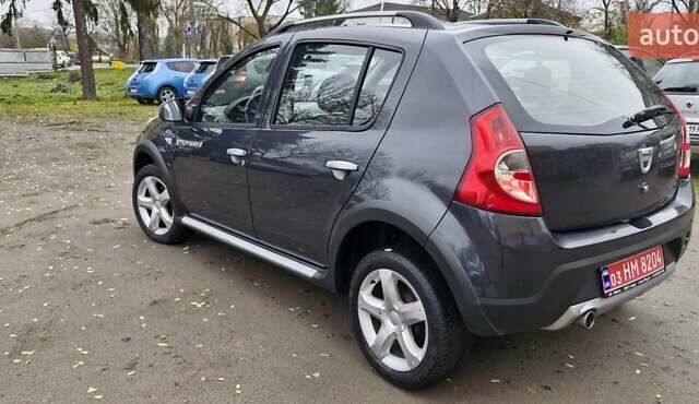 Серый Дачия Sandero StepWay, объемом двигателя 1.6 л и пробегом 128 тыс. км за 7300 $, фото 4 на Automoto.ua