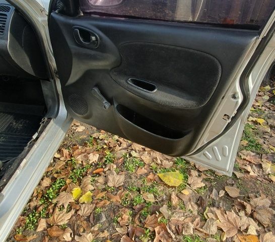 Серый Дэу Сиело, объемом двигателя 1.4 л и пробегом 3 тыс. км за 1067 $, фото 6 на Automoto.ua