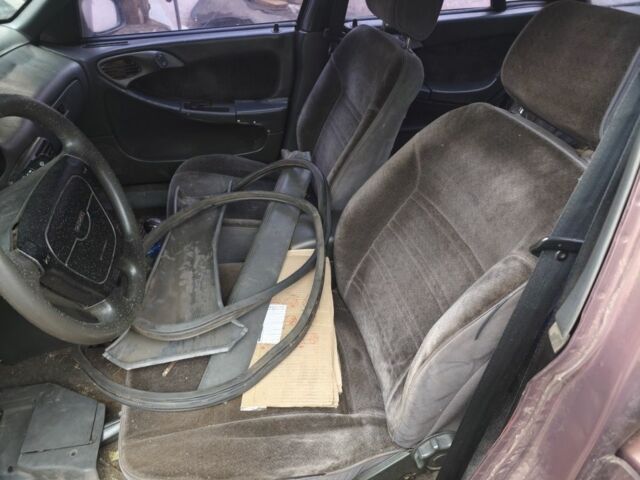 Коричневый Дэу Эсперо, объемом двигателя 2 л и пробегом 300 тыс. км за 284 $, фото 3 на Automoto.ua