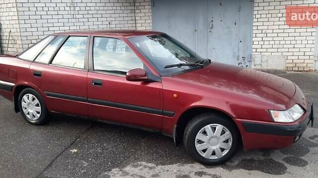 Красный Дэу Эсперо, объемом двигателя 2 л и пробегом 198 тыс. км за 1200 $, фото 1 на Automoto.ua