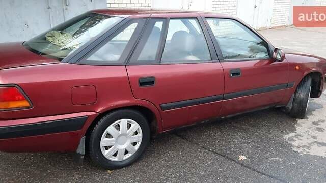 Красный Дэу Эсперо, объемом двигателя 2 л и пробегом 198 тыс. км за 1200 $, фото 4 на Automoto.ua