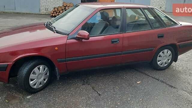 Красный Дэу Эсперо, объемом двигателя 2 л и пробегом 198 тыс. км за 1200 $, фото 3 на Automoto.ua