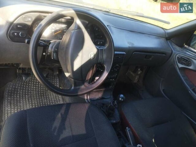 Красный Дэу Эсперо, объемом двигателя 1.5 л и пробегом 404 тыс. км за 555 $, фото 3 на Automoto.ua