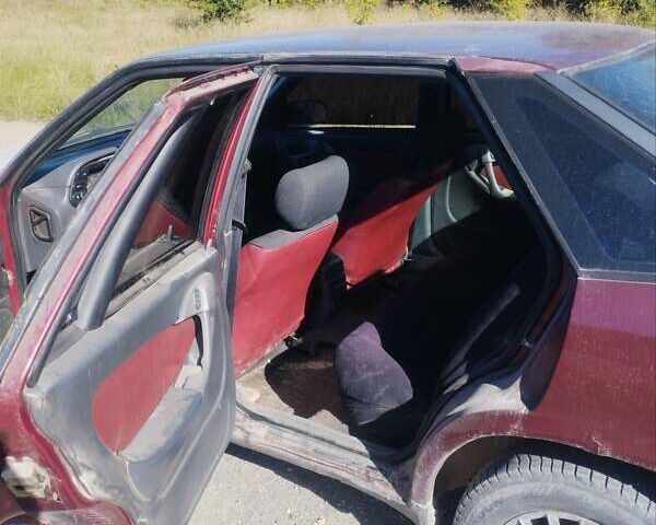 Красный Дэу Эсперо, объемом двигателя 1.5 л и пробегом 404 тыс. км за 555 $, фото 11 на Automoto.ua