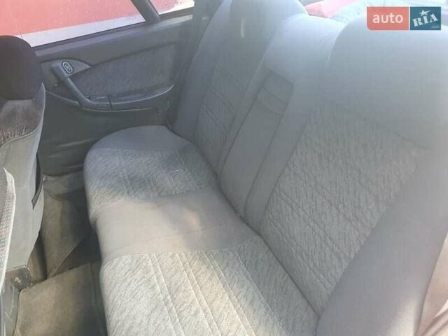 Красный Дэу Эсперо, объемом двигателя 2 л и пробегом 400 тыс. км за 1800 $, фото 3 на Automoto.ua