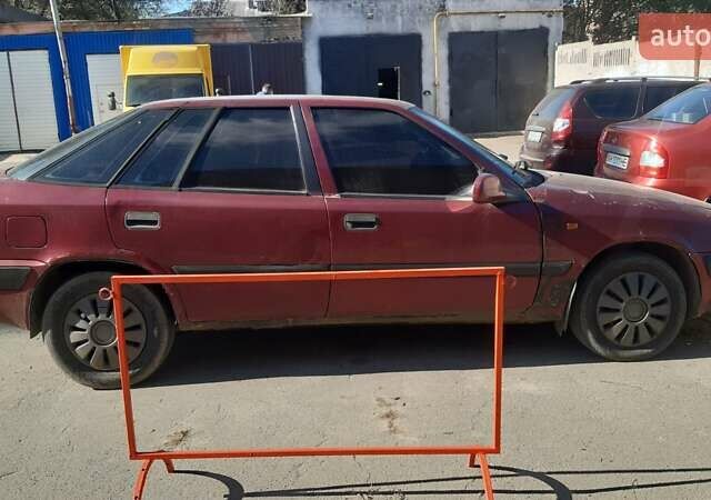 Красный Дэу Эсперо, объемом двигателя 2 л и пробегом 300 тыс. км за 1100 $, фото 1 на Automoto.ua