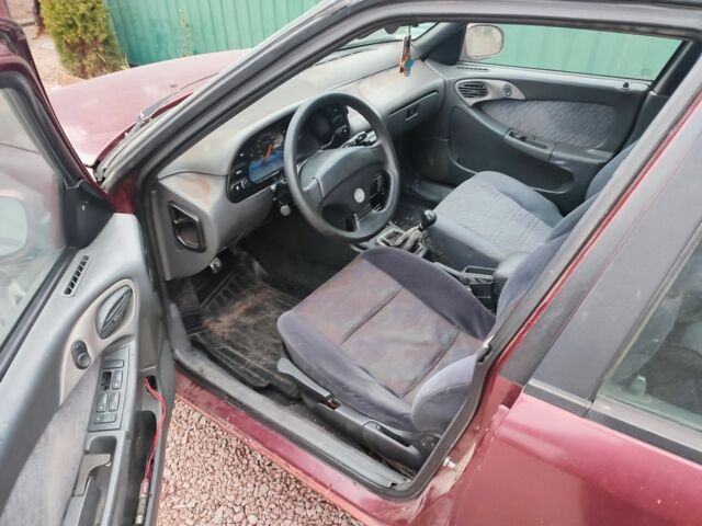 Червоний Деу Есперо, об'ємом двигуна 1.5 л та пробігом 200 тис. км за 1150 $, фото 5 на Automoto.ua