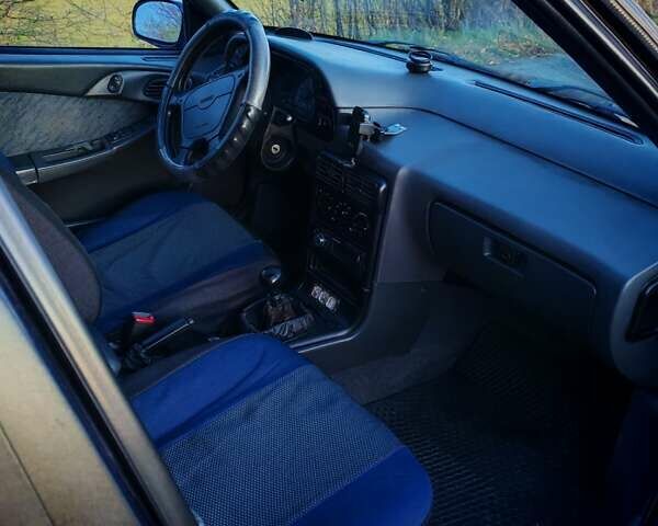 Синий Дэу Эсперо, объемом двигателя 2 л и пробегом 252 тыс. км за 2500 $, фото 26 на Automoto.ua