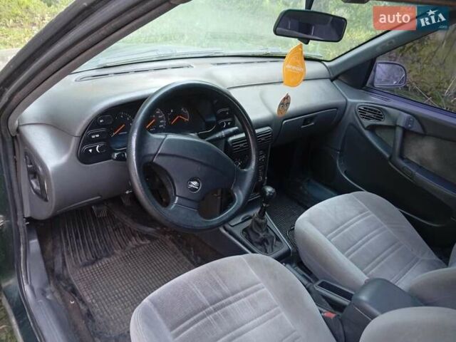 Зеленый Дэу Эсперо, объемом двигателя 2 л и пробегом 200 тыс. км за 1000 $, фото 7 на Automoto.ua