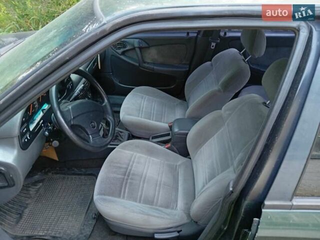 Зеленый Дэу Эсперо, объемом двигателя 2 л и пробегом 200 тыс. км за 1000 $, фото 6 на Automoto.ua