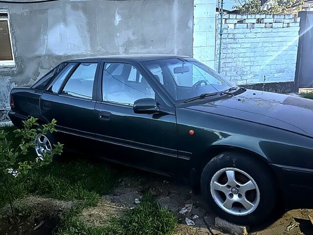 Зеленый Дэу Эсперо, объемом двигателя 2 л и пробегом 158 тыс. км за 2000 $, фото 5 на Automoto.ua
