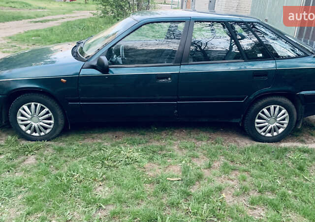 Зелений Деу Есперо, об'ємом двигуна 1.8 л та пробігом 400 тис. км за 1200 $, фото 4 на Automoto.ua