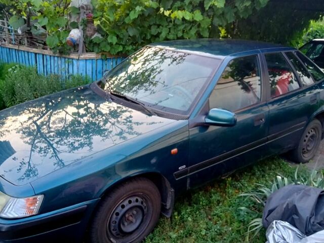 Зеленый Дэу Эсперо, объемом двигателя 2 л и пробегом 318 тыс. км за 1400 $, фото 1 на Automoto.ua