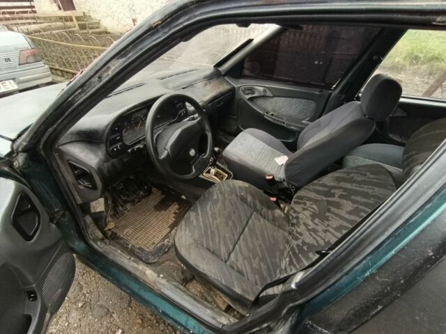 Зеленый Дэу Эсперо, объемом двигателя 1.5 л и пробегом 777 тыс. км за 450 $, фото 7 на Automoto.ua