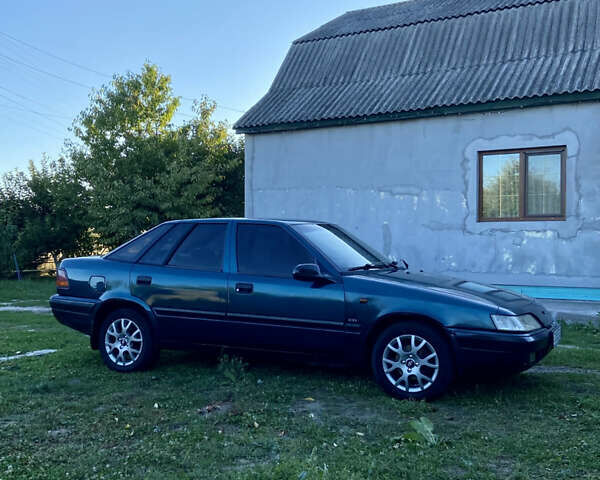 Зеленый Дэу Эсперо, объемом двигателя 2 л и пробегом 266 тыс. км за 1600 $, фото 4 на Automoto.ua