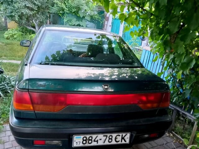 Зеленый Дэу Эсперо, объемом двигателя 2 л и пробегом 318 тыс. км за 1400 $, фото 2 на Automoto.ua