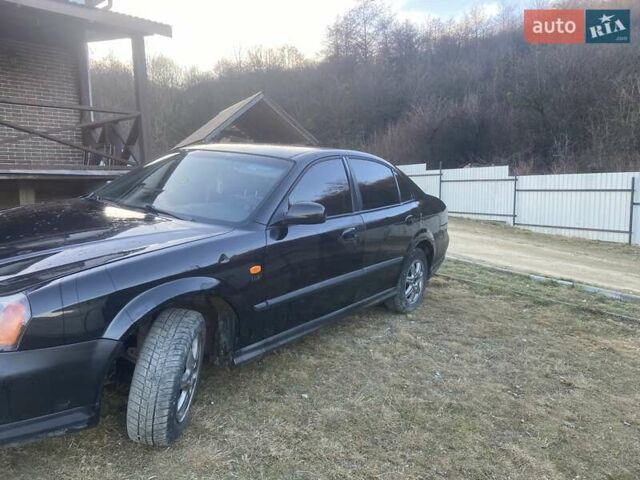 Черный Дэу Эванда, объемом двигателя 2 л и пробегом 210 тыс. км за 2200 $, фото 5 на Automoto.ua