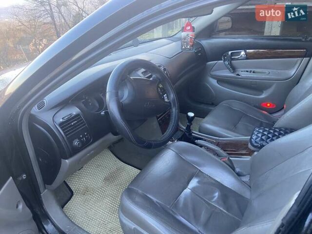 Черный Дэу Эванда, объемом двигателя 2 л и пробегом 210 тыс. км за 2200 $, фото 6 на Automoto.ua