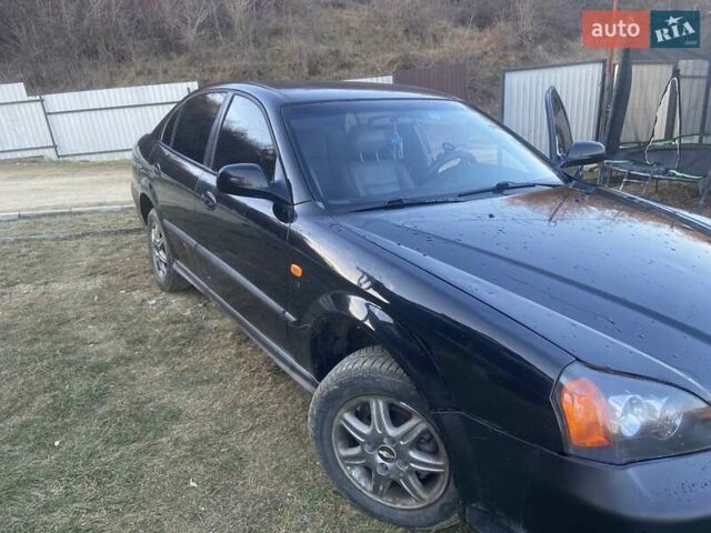 Черный Дэу Эванда, объемом двигателя 2 л и пробегом 210 тыс. км за 2200 $, фото 1 на Automoto.ua