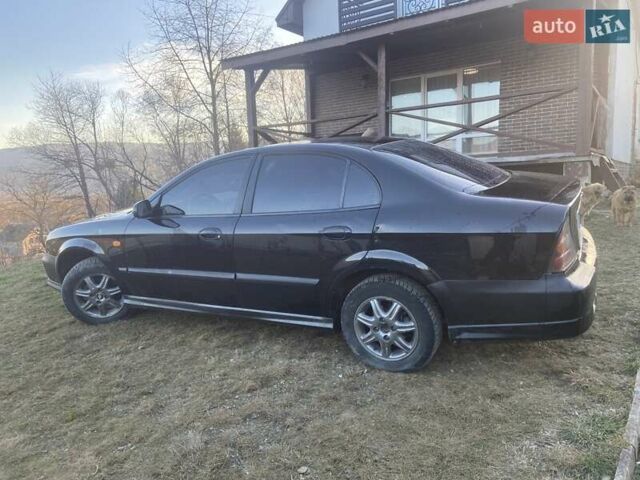 Черный Дэу Эванда, объемом двигателя 2 л и пробегом 210 тыс. км за 2200 $, фото 4 на Automoto.ua