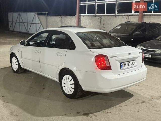 Білий Деу Джентра, об'ємом двигуна 1.49 л та пробігом 200 тис. км за 2999 $, фото 3 на Automoto.ua