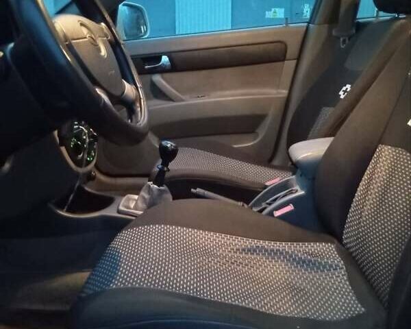 Белый Дэу Джентра, объемом двигателя 1.5 л и пробегом 240 тыс. км за 3555 $, фото 8 на Automoto.ua