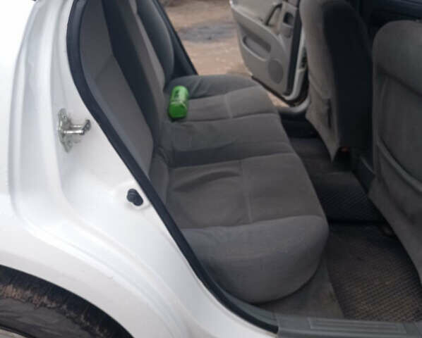 Білий Деу Джентра, об'ємом двигуна 1.49 л та пробігом 250 тис. км за 3800 $, фото 6 на Automoto.ua