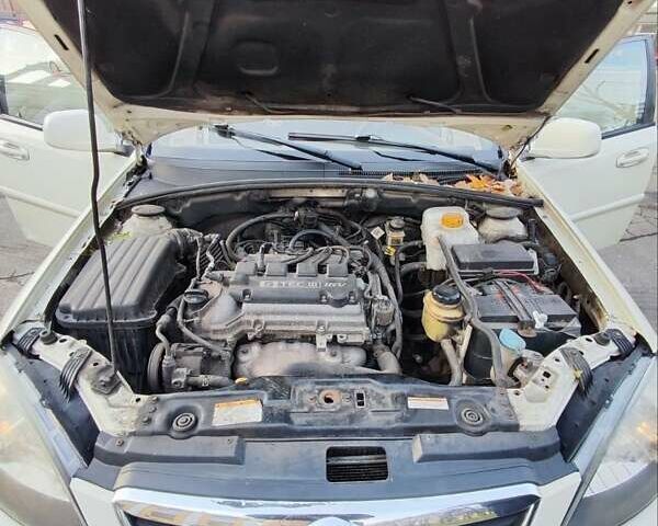 Білий Деу Джентра, об'ємом двигуна 1.49 л та пробігом 211 тис. км за 4300 $, фото 18 на Automoto.ua