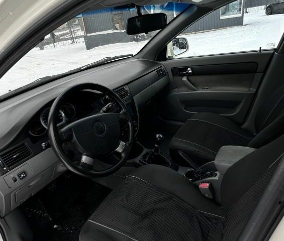 Бежевый Дэу Джентра, объемом двигателя 1.6 л и пробегом 160 тыс. км за 4600 $, фото 7 на Automoto.ua