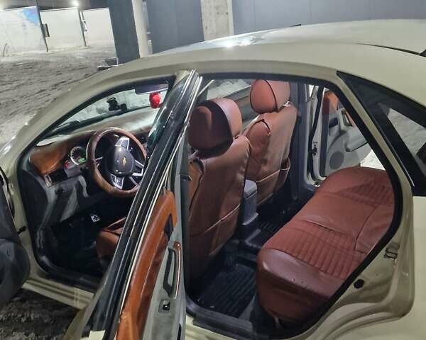Бежевий Деу Джентра, об'ємом двигуна 1.49 л та пробігом 194 тис. км за 3999 $, фото 12 на Automoto.ua