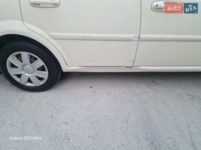 Бежевий Деу Джентра, об'ємом двигуна 1.49 л та пробігом 194 тис. км за 3999 $, фото 7 на Automoto.ua