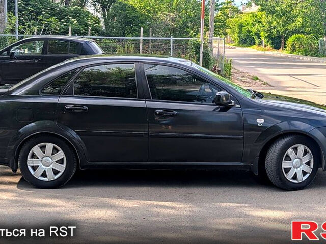 Черный Дэу Джентра, объемом двигателя 1.5 л и пробегом 260 тыс. км за 3800 $, фото 4 на Automoto.ua