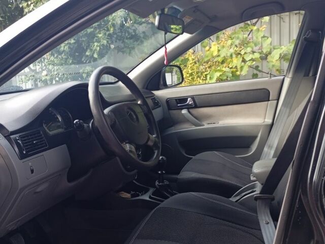 Черный Дэу Джентра, объемом двигателя 1.5 л и пробегом 88 тыс. км за 5500 $, фото 4 на Automoto.ua