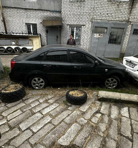 Черный Дэу Джентра, объемом двигателя 1.5 л и пробегом 195 тыс. км за 2350 $, фото 1 на Automoto.ua