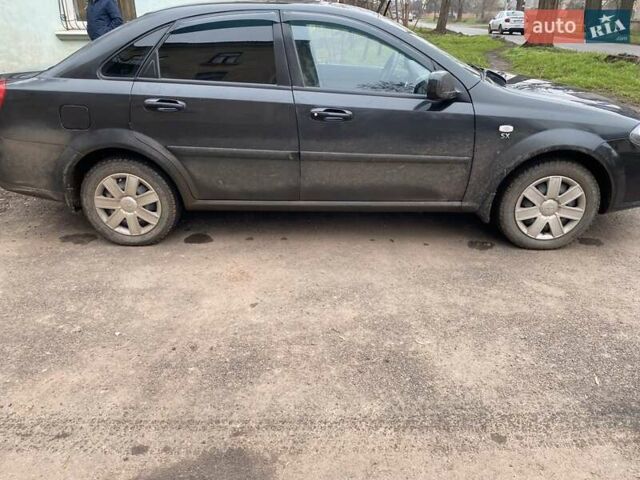 Черный Дэу Джентра, объемом двигателя 1.49 л и пробегом 82 тыс. км за 6000 $, фото 3 на Automoto.ua