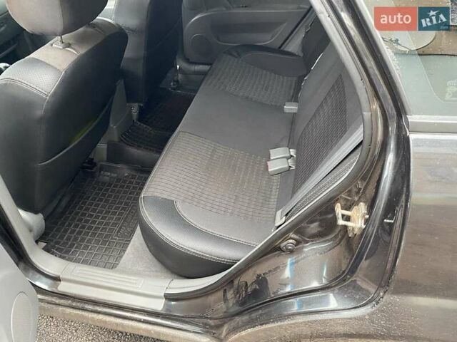 Черный Дэу Джентра, объемом двигателя 1.49 л и пробегом 82 тыс. км за 6000 $, фото 7 на Automoto.ua