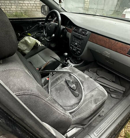 Черный Дэу Джентра, объемом двигателя 1.5 л и пробегом 195 тыс. км за 2350 $, фото 3 на Automoto.ua