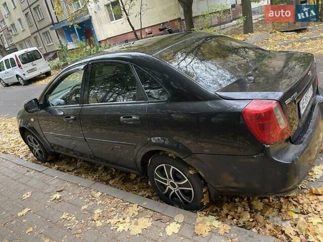 Черный Дэу Джентра, объемом двигателя 1.5 л и пробегом 264 тыс. км за 3700 $, фото 1 на Automoto.ua