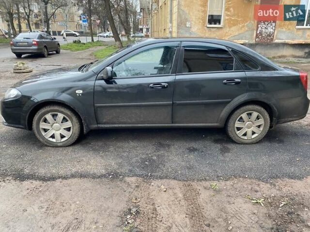 Черный Дэу Джентра, объемом двигателя 1.49 л и пробегом 82 тыс. км за 6000 $, фото 2 на Automoto.ua