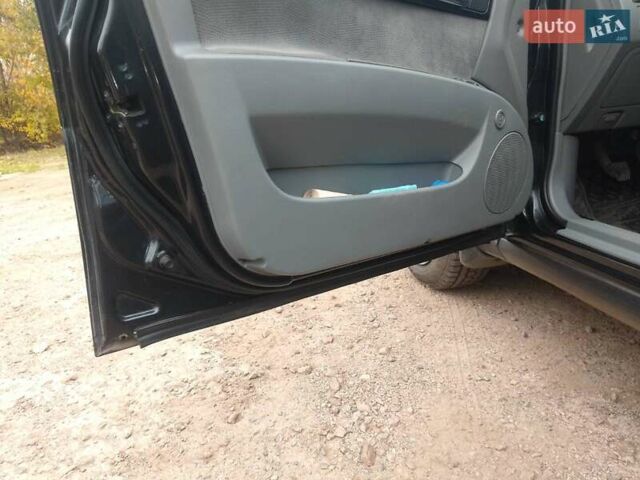 Чорний Деу Джентра, об'ємом двигуна 1.49 л та пробігом 112 тис. км за 4730 $, фото 6 на Automoto.ua