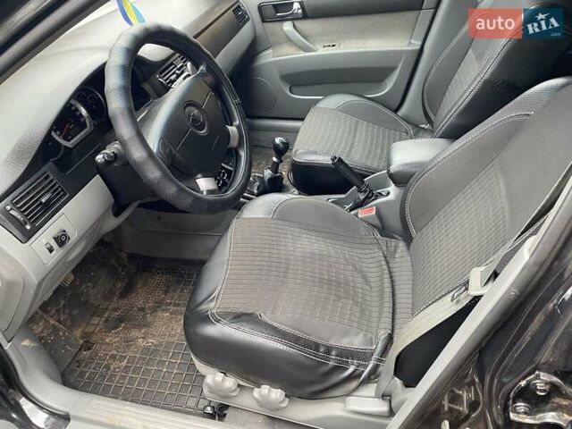 Черный Дэу Джентра, объемом двигателя 1.49 л и пробегом 82 тыс. км за 6000 $, фото 6 на Automoto.ua